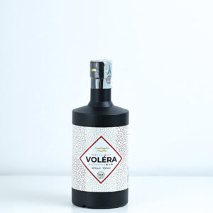 Bottiglia di Gin Voléra artigianale italiano con Limone di Sorrento e botaniche mediterranee