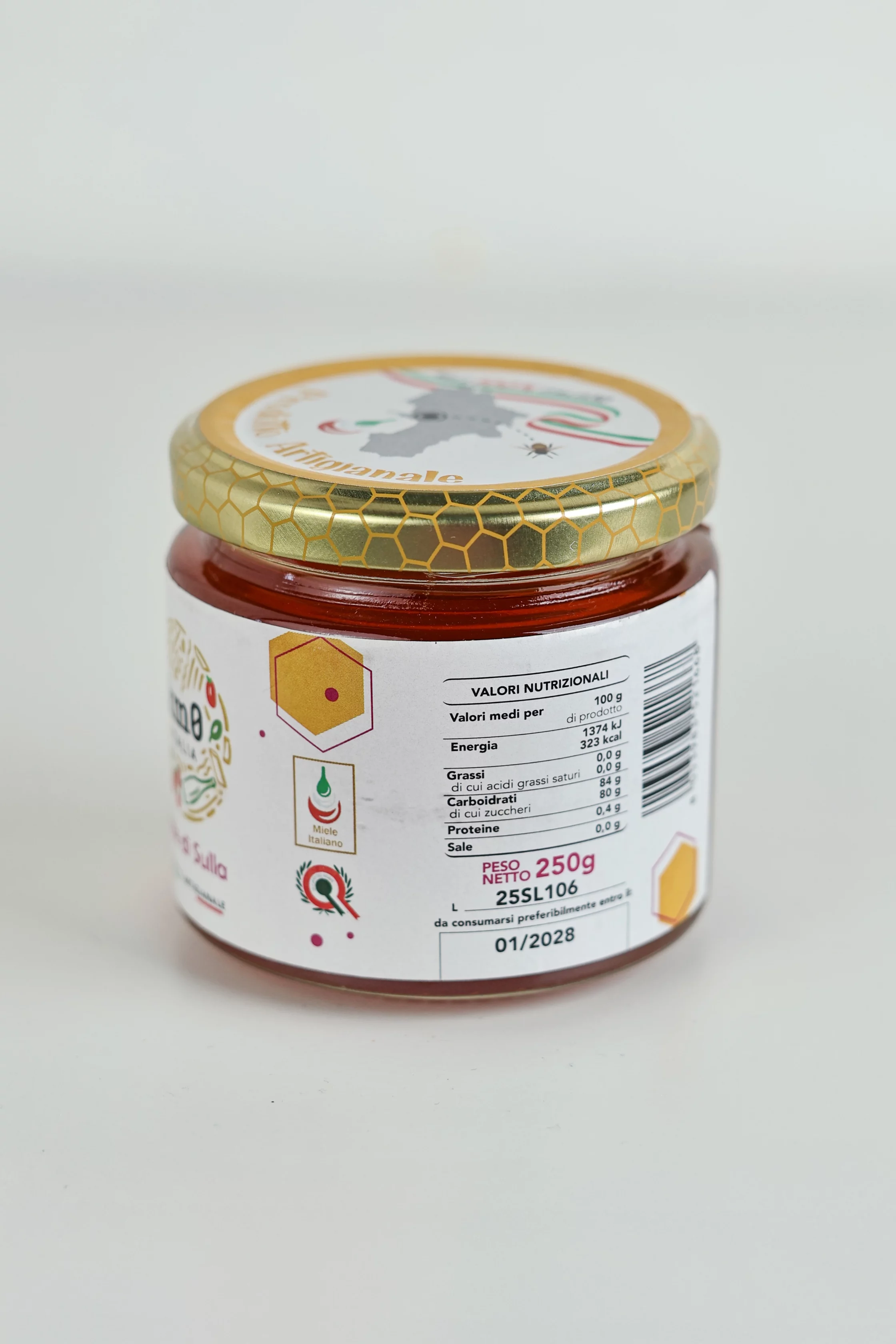 Miele di sulla artigianale Km0italia in vasetto di vetro con consistenza naturale e colore chiaro