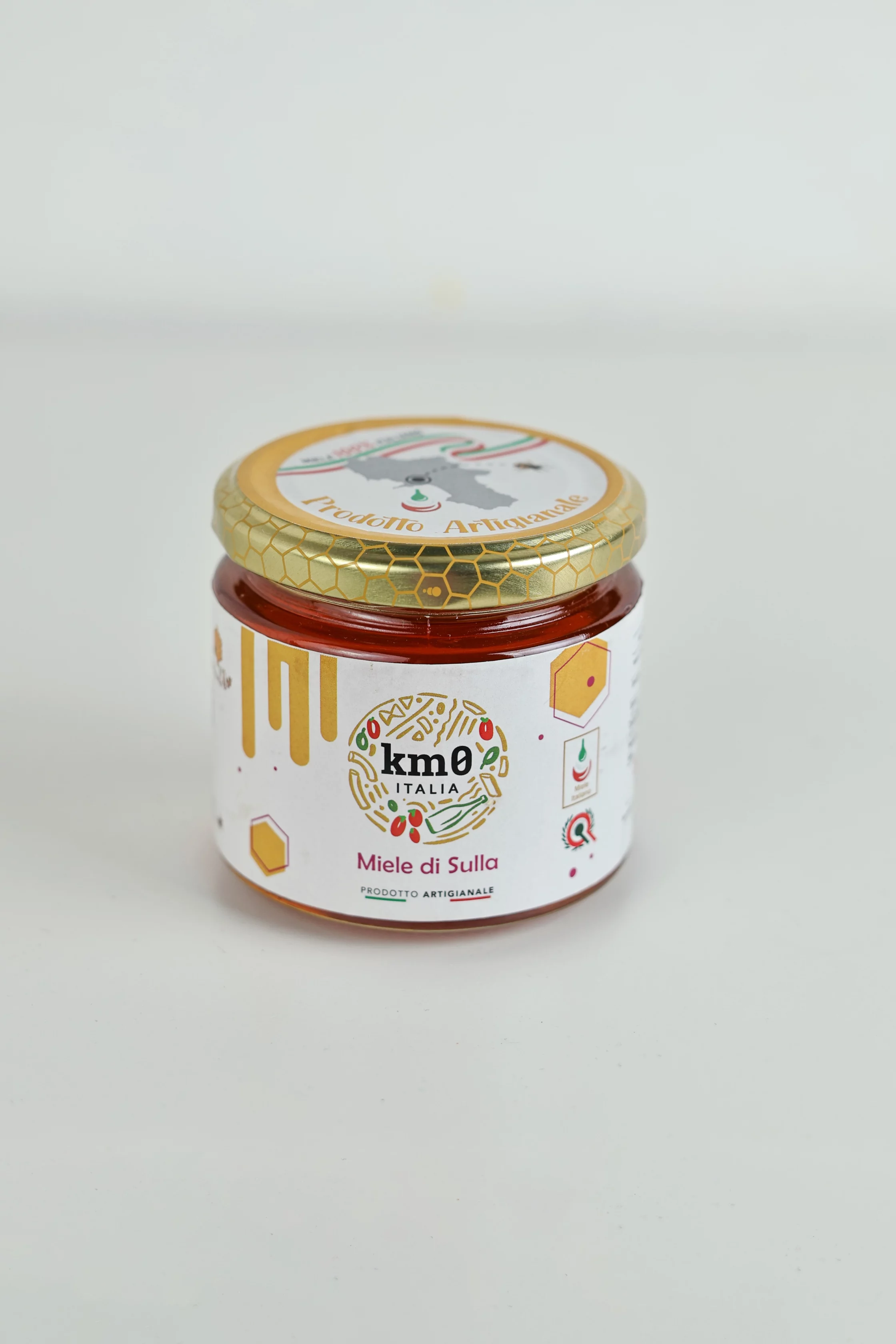 Miele di sulla artigianale Km0italia in vasetto di vetro con consistenza naturale e colore chiaro